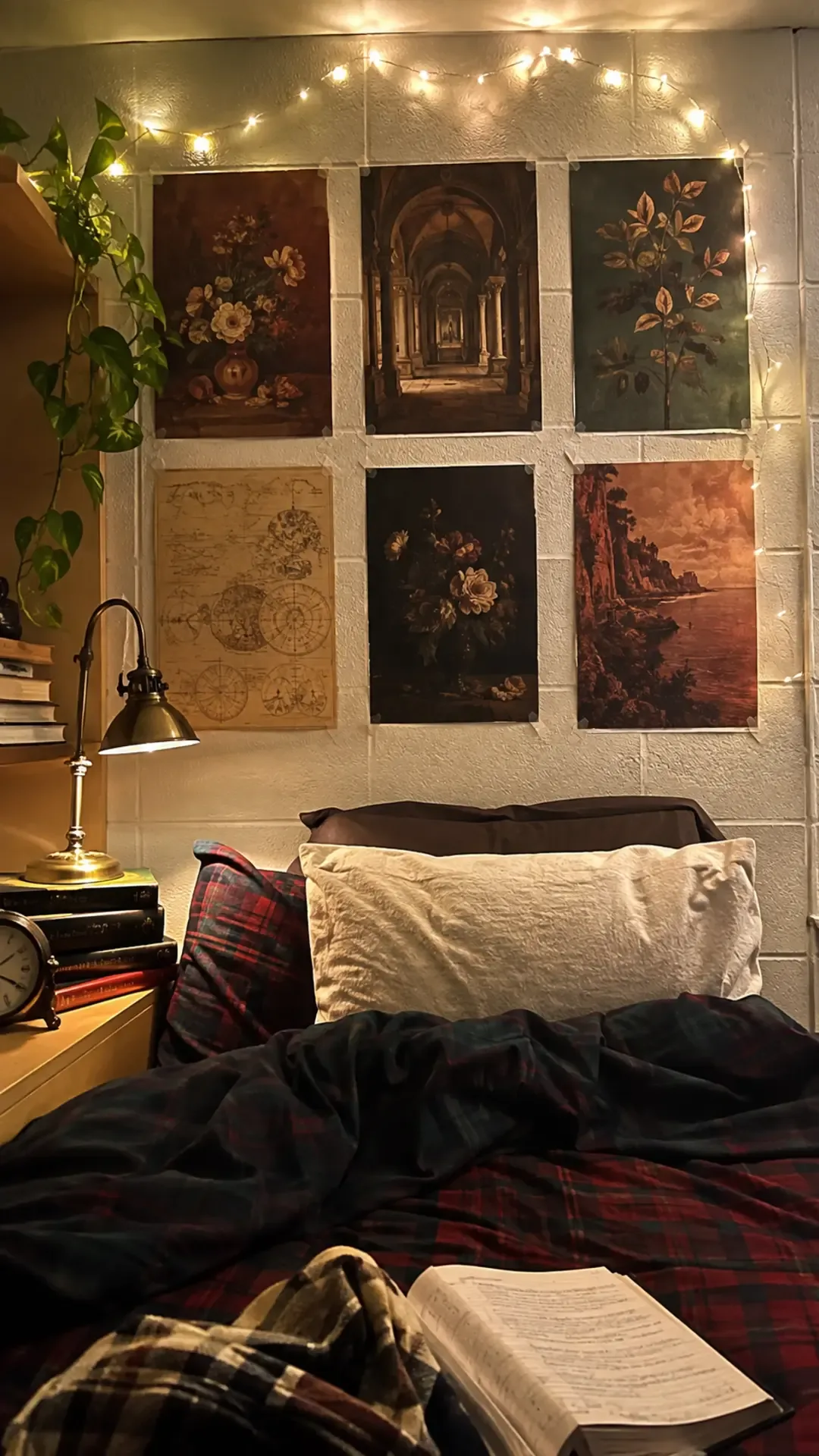 Dark academia poster wall with antique maps and botanical illustrations in a dorm